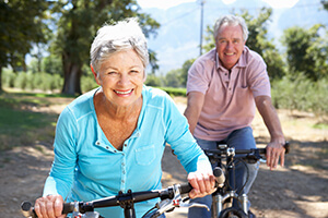 Older couple smiling after cataract surgery